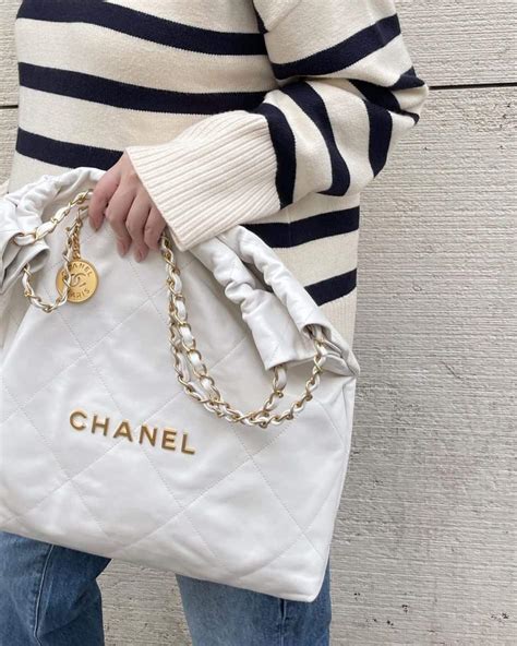 white chanel purse|chanel 22 bag small price.